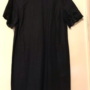 Black Dress with Eyelet and Embroidered Design on Sleeves